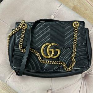 Gucci Marmont black medium shoulder bag.